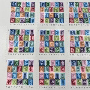 USPS The mystery message of 2021 is always top-notch, fun and celebratory